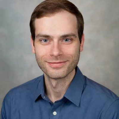 Drake Stapleton in a blue collared shirt